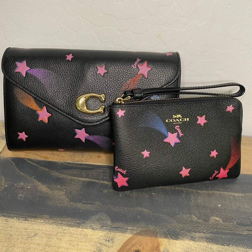 Coach black w/ pink stars crossbody and matching wallet